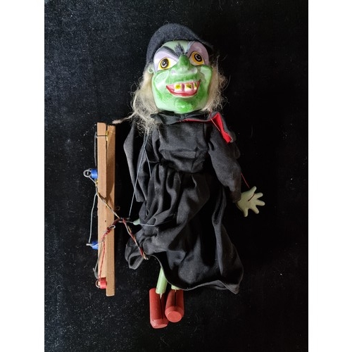 A vintage Green Witch Marionette 'Pelham Puppets' Made in England. In original box. This is wicked