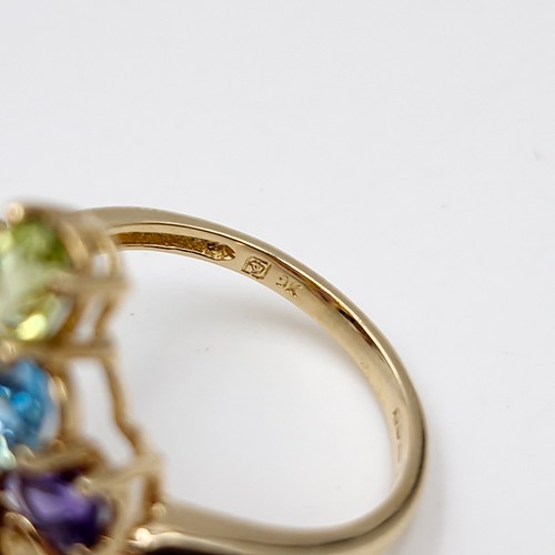 6 - Star Lot : A Beautiful nine carat gold vari hue gemstone ring with topaz, Amethyst, Peridot, Citrine... 