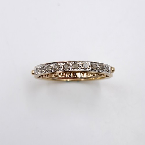 9 - Star Lot : A nine carat gold diamond half eternity ring with message to band 'I love you'. Ring size... 