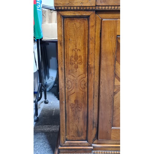 938 - Star Lot : A large oak Italian sideboard featuring exquisite inlaid panels, complemented by two eleg... 