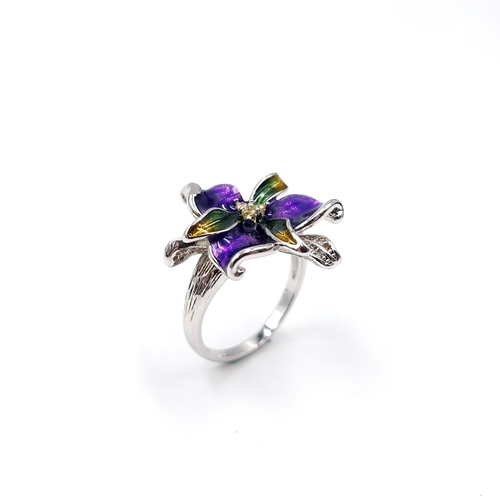 17 - A sterling silver amethyst gem set stone ring with enamelled detailing. Ring size - O. Weight - 5.4 ... 