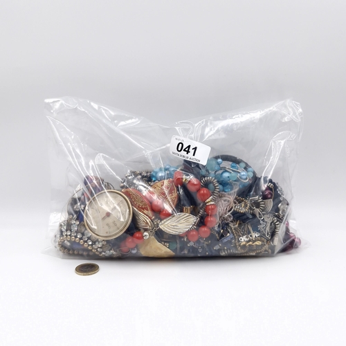 41 - A large bag of assorted costume jewellery, unchecked. As per photographed. Weight - 740 grams.