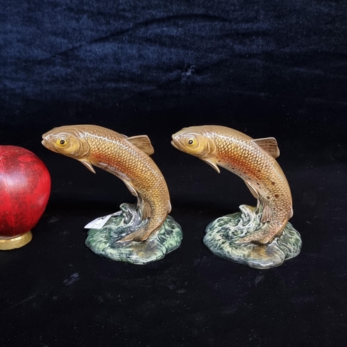 118 - A wonderful pair of Beswick ceramic Leaping Trout figurines. Both in good order.