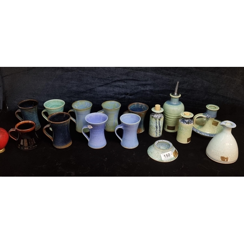 150 - A collection of 15 pieces of Louis Mulcahy Irish studio pottery. In tonal shades of green and blues.