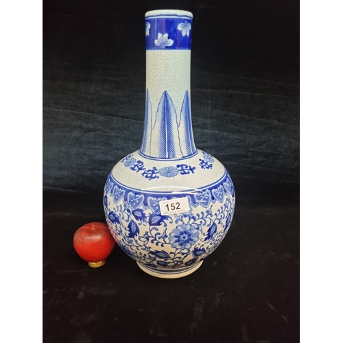 152 - A fabulous large blue and white antique style ceramic bulbous vase featuring a crackle glaze. In ver... 