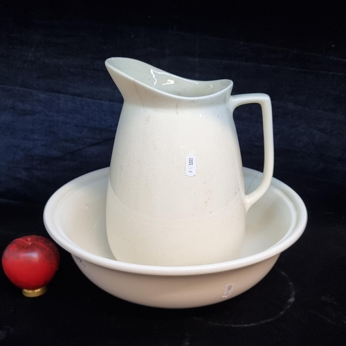 170 - An antique ceramic wash basin and water jug. Both in good condition.