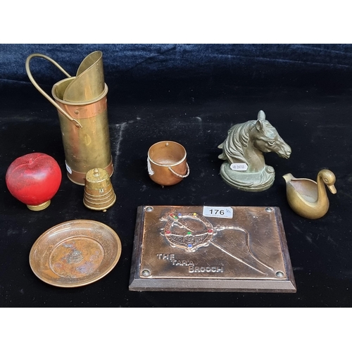 176 - A mixed lot of vintage copper and brass items including a wall plaque depicting The Tara Brooch and ... 