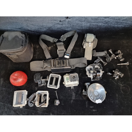 183 - GoPro Hero 3 camera set with lots and lots of accessories, including mounts and carrying case.