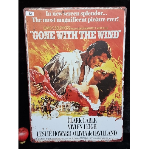 192 - A large heavy printed metal wall sign of a vintage poster advertising the iconic movie Gone with the... 