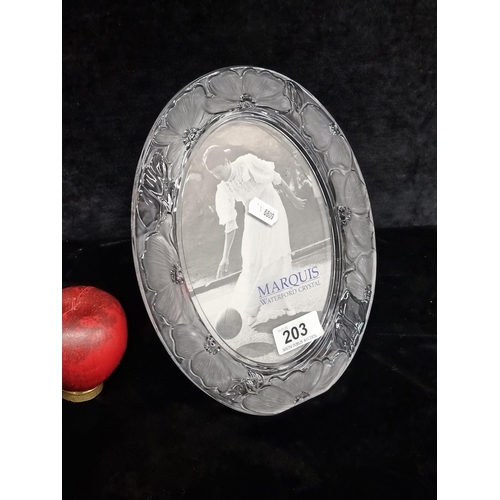 203 - A Marquis by Waterford Crystal oval picture frame with floral design. In verry good condition with a... 