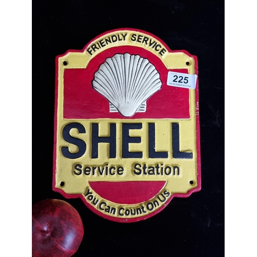 225 - A heavy cast metal hand painted wall plaque advertising Shell Service Station.