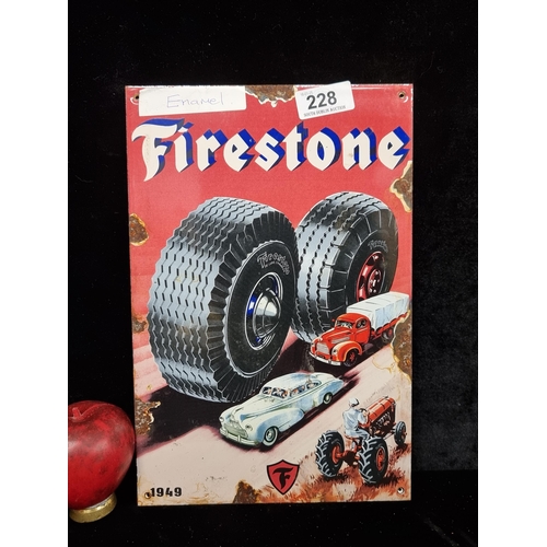 228 - A heavy enamel wall plaque advertising Firestone.