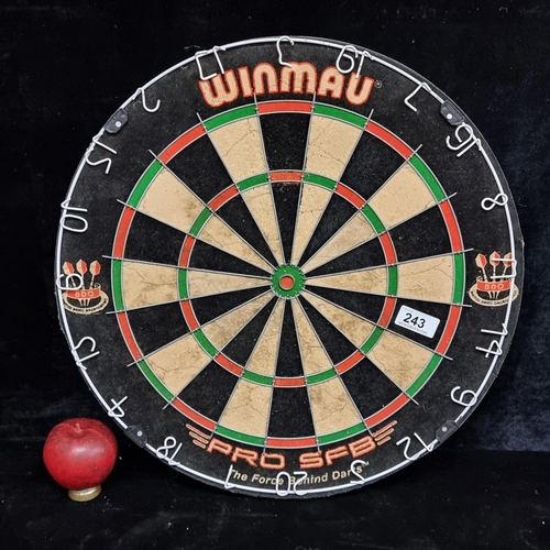 243 - A high quality Winmau Pro SFB bristle dartboard.