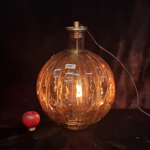 247 - A stunning large amber glass 'Light & Living' light fixture. It looks pink when it's off.