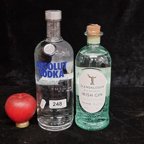 248 - Two sealed bottles of alcohol including a 700ml bottle of Glendalough Irish Gin, along with a 1 Litr... 