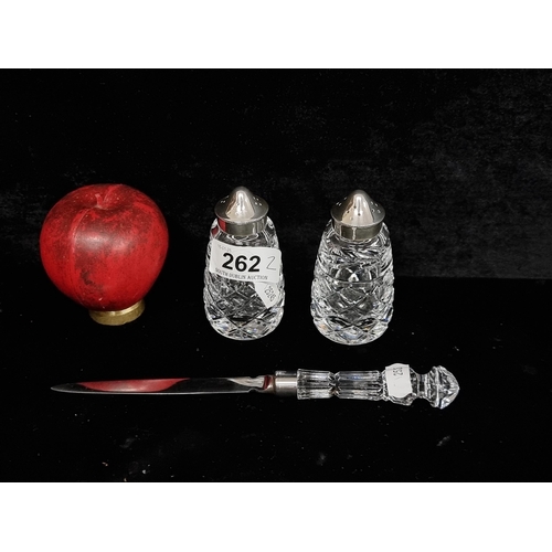 262 - A pair of Waterford Crystal salt and pepper shakers, with a Waterford crystal letter opener