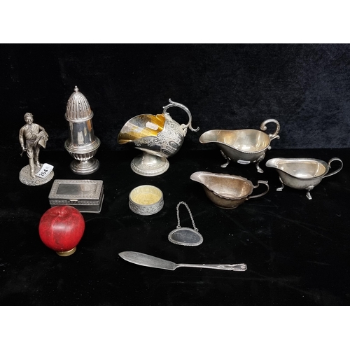 264 - A selection of vintage silver plated items including an elegant salt pig, gravy bowl and figure of a... 