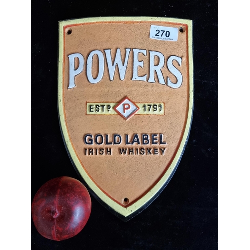 270 - A heavy cast metal advertising wall plaque for Powers Irish Whiskey.