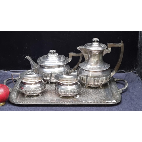 294 - Five antique silver plated items including a coffee pot, tea pot, cream, sugar bowl and serving tray... 