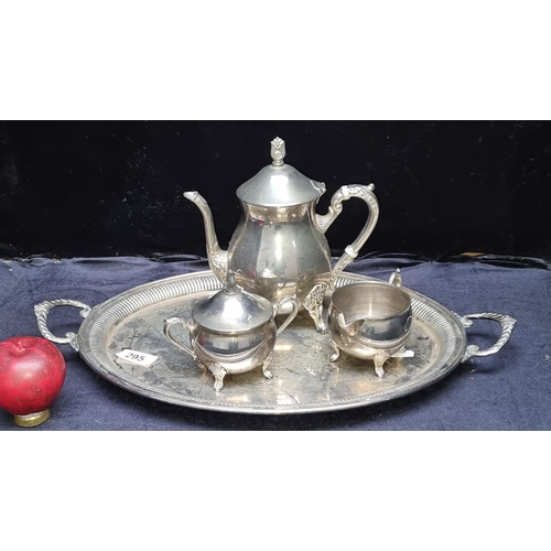 295 - Four antique silverplated items including a cofee pot, creamer, sugar bowl all featuring ornate hand... 