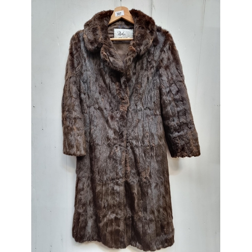 307 - Star Lot: A beautiful Rohu Furriers Dublin Ltd genuine brown soft fur mid length coat. Fur in lovely... 