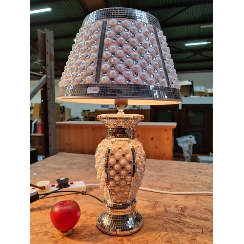 319 - A fabulous bejeweled table lamp, embellished with dazzling diamanté and lustrous pearl detailing.