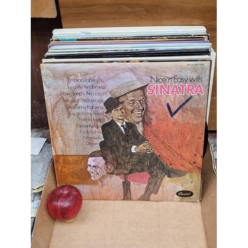 322 - A collection of 30 vinyl records including Frank Sinatra, Josef Locke, The Electric Indian, Johnnie ... 