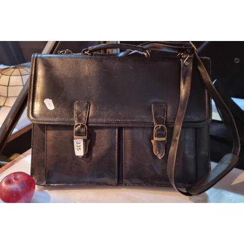 335 - A very handsome Salisbury's black leather briefcase / laptop bag with shoulder strap and brass hardw... 