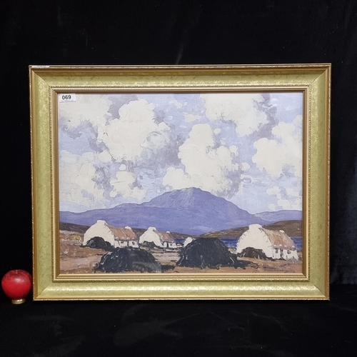 69 - A very large high quality print of a Paul Henry Painting of Connemara housed in an elaborate gilt fr... 