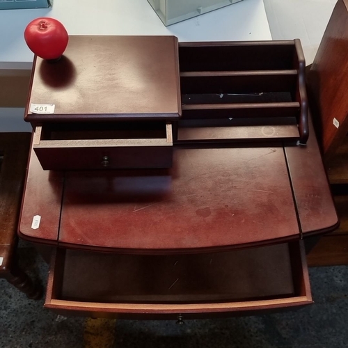 401 - Vintage mahogany writing desk, featuring a curved front, single drawer, cubbies, and raised shelf.