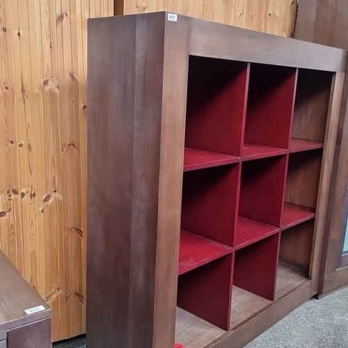 413 - Star Lot : A high end Arca office lovely contemporary modern wooden shelving unit with nine red cubb... 