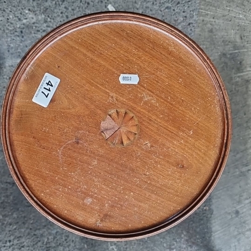 417 - Vintage mahogany pedestal wine table, featuring tripod cabriole legs and a carved circular top with ... 