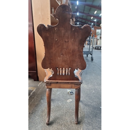 420 - Star lot : A black forest 19th-Century European carved walnut chair with lift-up secret seat, intric... 