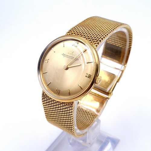 7 - Super Star Lot:
A beautiful Jaeger-LeCoultre manual wind gents' watch with an 18ct gold mesh strap. ...