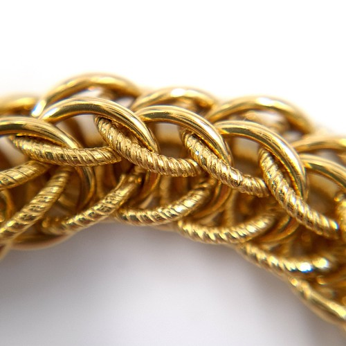 8 - Super Star Lot:
An 18ct gold bracelet with a delicate intertwined band and a heavy gold clasp.

Leng... 