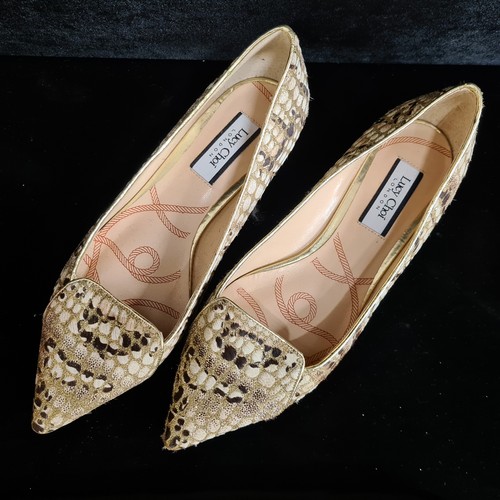 448 - A stylish pair of designer Lucy Choi, niece of Jimmy Choo, animal print flats with pointed toe compl... 