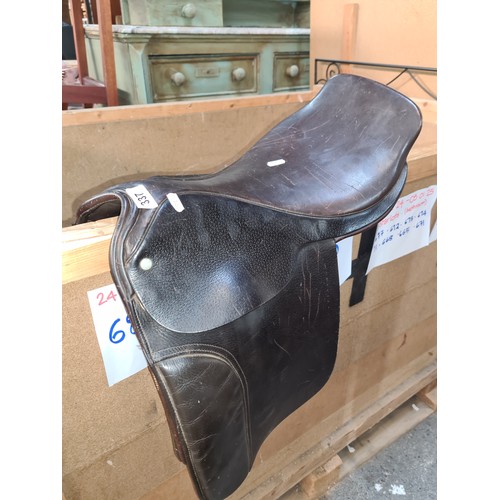 337 - Star Lot : A quality English leather Cliff Barnsby show pony saddle. Stamped with the Royal Warrant ... 