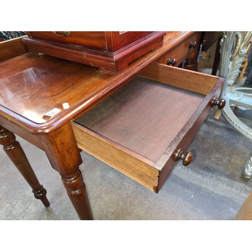 362 - Star Lot : A lovely Victorian mahogany antique desk / washstand with gallery back , turned legs and ... 