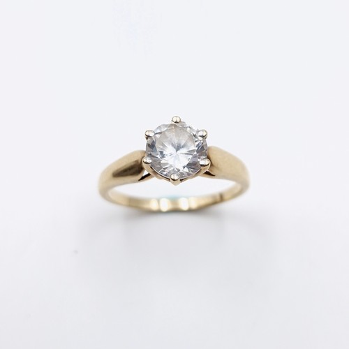 45 - Star Lot : A gem set claw mounted 10 carat Solitaire gold ring. Ring size - O. Weight - 2.42 grams.