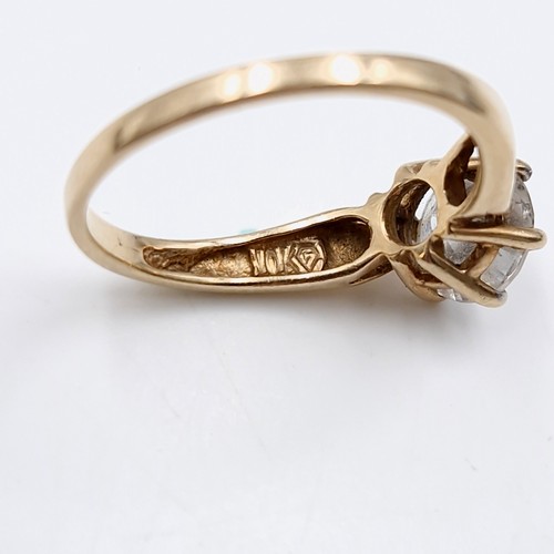 45 - Star Lot : A gem set claw mounted 10 carat Solitaire gold ring. Ring size - O. Weight - 2.42 grams.