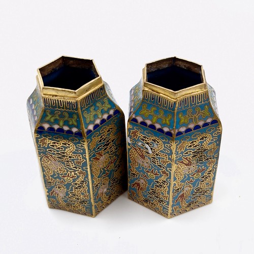 569 - A fine pair of  matching pair of Chinese Cloisonne enamel lidded jars. Height - 7.5 cms. Base - 4 cm... 