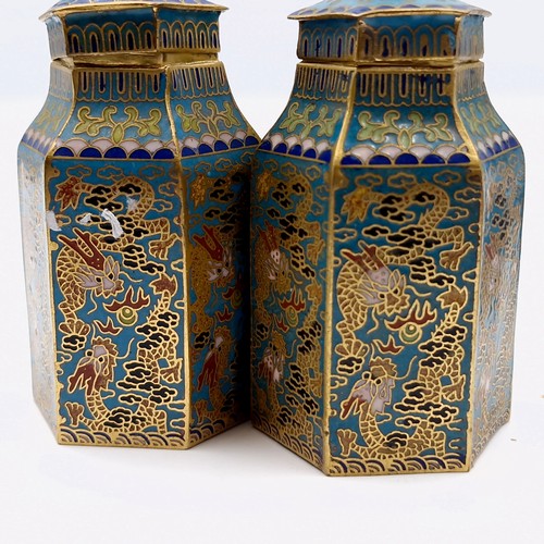 569 - A fine pair of  matching pair of Chinese Cloisonne enamel lidded jars. Height - 7.5 cms. Base - 4 cm... 