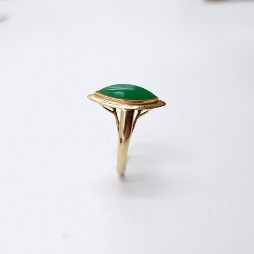 574 - A nine carat gold jade ring. Size - M. Weight - 2.21 grams. Boxed.