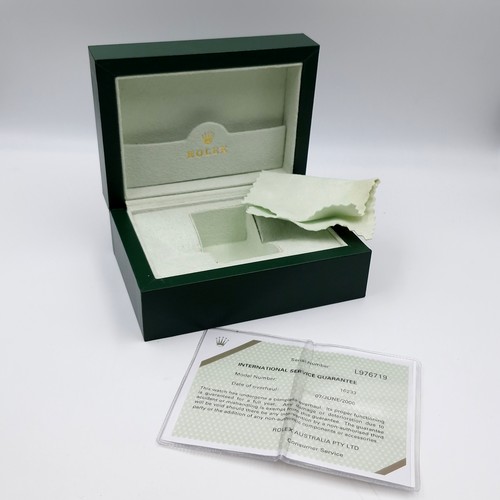 599 - A Rolex watch box in as new condition. Together with international service guarantee. Dated 7-06-200... 