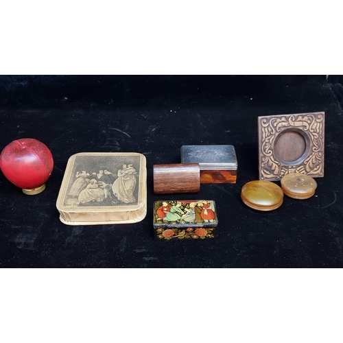 196 - A lot of seven antique pieces including a hand carved wooden frame, along with six dainty boxes, snu... 