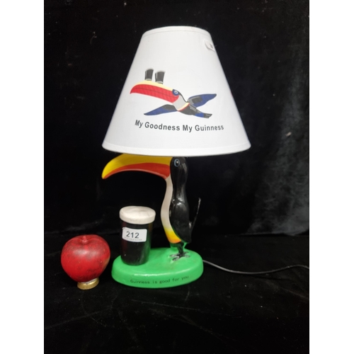 212 - A charming Guinness Toucan table lamp with 'My Goodness My Guinness' printed shade.