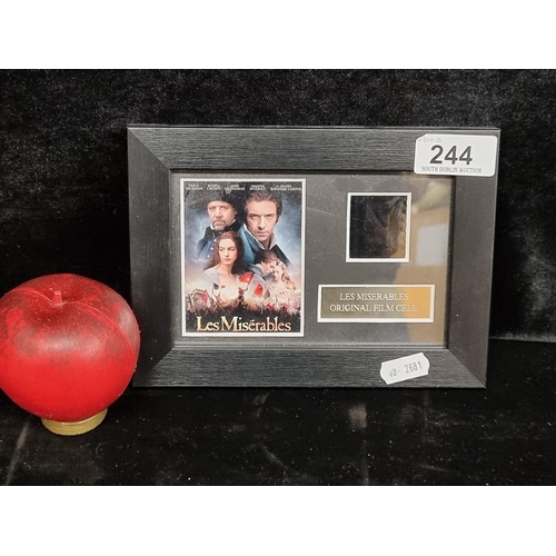 244 - A certified framed Les Miserables original 35mm film cell, authenticated by E-Frame Posters.