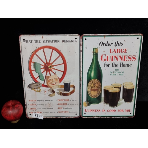 257 - Two advertising Guinness metal wall plaques / Pub signs