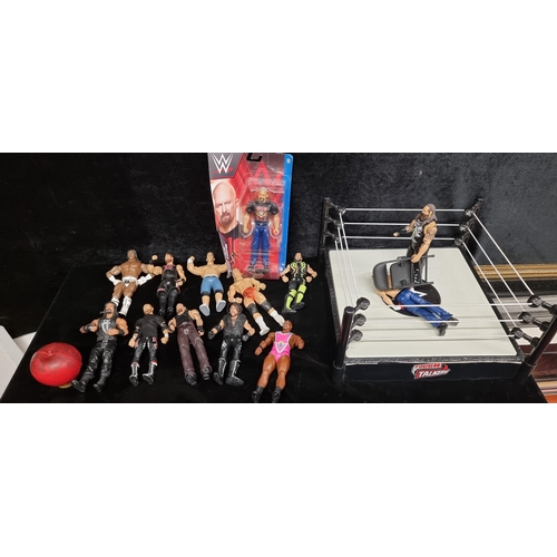 261 - A 'WWE Tough Talkers' Ring Set with Wrestler figures. Features a large selection of figures, Includi... 