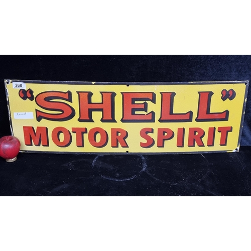 268 - A large heavy enamel wall plaque advertising sign. Features 'Shell Motor Spirit'. In yellow and red ... 